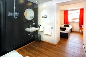 Kúpeľňa v ubytovaní Berghotel-Gasthof Gstrein
