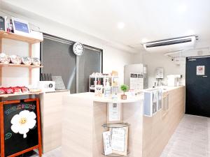 Köök või kööginurk majutusasutuses Osaka Nipponbashi EVISU HOSTEL