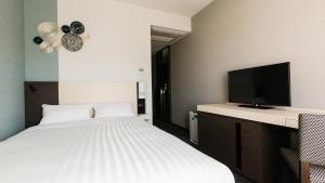 TV a/nebo společenská místnost v ubytování JR-East Hotel Mets Mizonokuchi