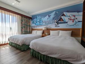 Letto o letti in una camera di Howard Kenting Wonder House