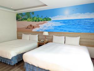 Letto o letti in una camera di Howard Kenting Wonder House