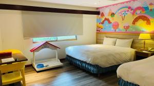 Letto o letti in una camera di Howard Kenting Wonder House