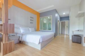 Postel nebo postele na pokoji v ubytování Eastpana Hotel - SHA Extra Plus