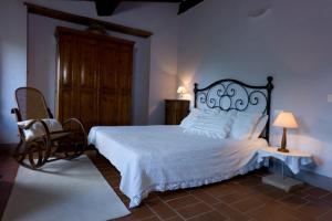 Postel nebo postele na pokoji v ubytování Agriturismo Podere Costarella