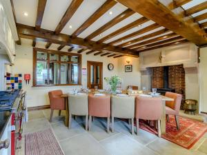 a large dining room with a table and chairs at The Marle in Hazelwood