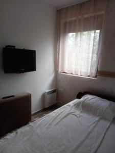 Postel nebo postele na pokoji v ubytování Holiday Tara