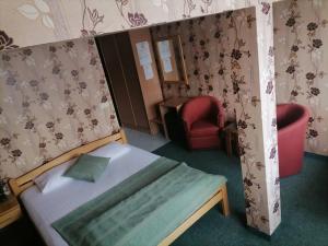 Letto o letti in una camera di Hotel Slodes