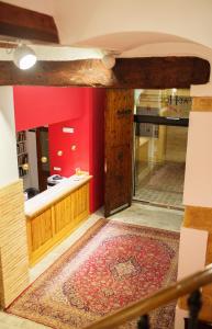 an entrance to a store with a red wall at Ad Hoc Carmen in Valencia