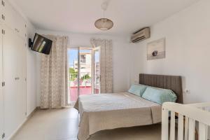 Postel nebo postele na pokoji v ubytování Villa Santa Lucia + 16 fotografií