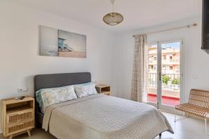 Łóżko lub łóżka w pokoju w obiekcie Villa Santa Lucia