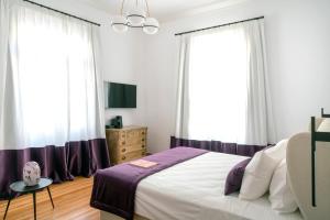 Posteľ alebo postele v izbe v ubytovaní Athens Flair