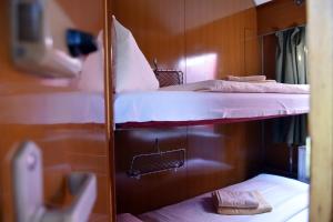 Postel nebo postele na pokoji v ubytování Wolkensteiner Zughotel