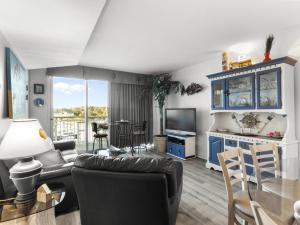 a living room with a couch and a table at Harbourgate Marina #312 in Myrtle Beach