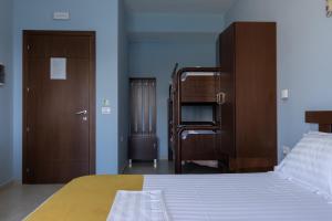 Postel nebo postele na pokoji v ubytování Hotel De Luna