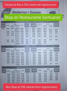 un cartel que dice parada de autobús a metros de la agricultura en Agroturismo Erlete Goikoa -ESTAMOS EN EL CAMINO DE SANTIAGO -WE ARE ON THE CAMINO DE SANTIAGO, en Deba