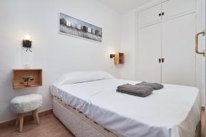 A bed or beds in a room at WELCS APARTAMENTO 020 EMP en la Playa