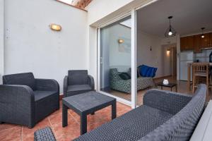 A seating area at WELCS APARTAMENTO 020 EMP en la Playa