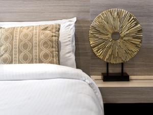 Voodi või voodid majutusasutuse Vastu Boutique Hotel toas