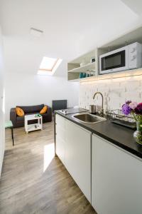 Kuchyňa alebo kuchynka v ubytovaní Modern apartment in the very central location 18