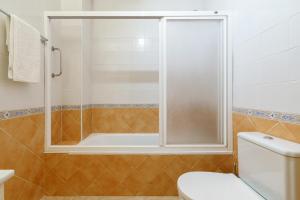 a bathroom with a shower and a toilet at CT 138 - La Cala Boulevard - Apartement I in La Cala de Mijas