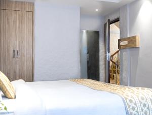 Voodi või voodid majutusasutuse Vastu Boutique Hotel toas