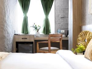 Voodi või voodid majutusasutuse Vastu Boutique Hotel toas
