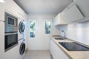Kuchnia lub aneks kuchenny w obiekcie Townhouse beachfront in Costalita