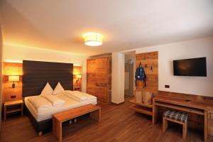 Posteľ alebo postele v izbe v ubytovaní Hotel Astoria