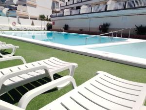 The swimming pool at or close to Balcón de Amadores 1
