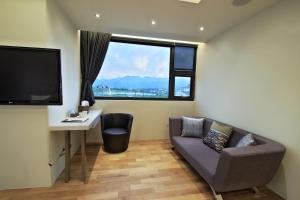 TV a/nebo společenská místnost v ubytování Han-Shian Boutique B&B