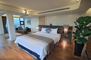 Postel nebo postele na pokoji v ubytování Han-Shian Boutique B&B