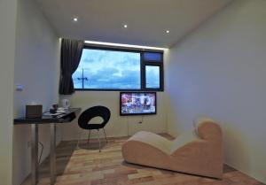 TV a/nebo společenská místnost v ubytování Han-Shian Boutique B&B
