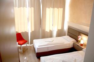 Postel nebo postele na pokoji v ubytování Isar City Hotel