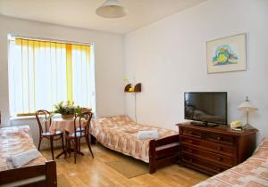 Łóżko lub łóżka w pokoju w obiekcie Hotel Monttis
