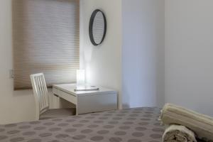 Łóżko lub łóżka w pokoju w obiekcie Altea La Nova