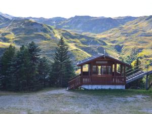 a gazebo on the side of a mountain at Studio Les Menuires, 1 pièce, 3 personnes - FR-1-452-3 in Les Menuires