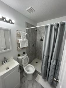 Ein Badezimmer in der Unterkunft Incredible comfortable apartments near the airport and beaches