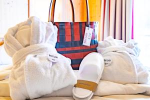 Postel nebo postele na pokoji v ubytování Hotel Latini