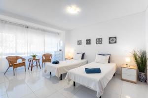 Ein Bett oder Betten in einem Zimmer der Unterkunft Eurosol Carihuela