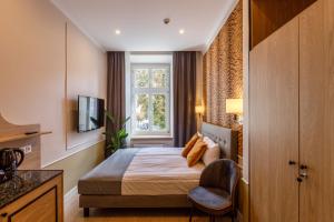 Posteľ alebo postele v izbe v ubytovaní AR Apartamenty