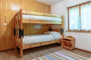 Posteľ alebo postele v izbe v ubytovaní Al Faggio Ponciach Altavalle OSPITAR