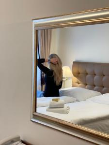 Postel nebo postele na pokoji v ubytování WINDSOR SPA Hotel