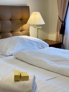 Postel nebo postele na pokoji v ubytování WINDSOR SPA Hotel