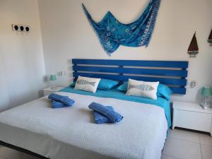 Posteľ alebo postele v izbe v ubytovaní Casa del Caballero