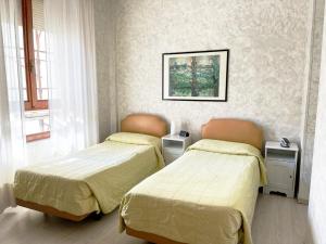Postel nebo postele na pokoji v ubytování Hotel Molise 2