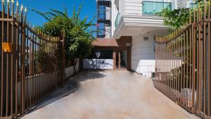 an entrance to a building with an iron fence at Vera Park Premium Apart Hotel in Antalya