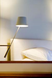Posteľ alebo postele v izbe v ubytovaní Enastron Guesthouse