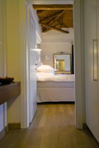Posteľ alebo postele v izbe v ubytovaní Enastron Guesthouse