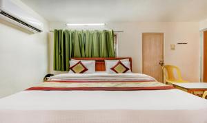 Postel nebo postele na pokoji v ubytování HI BLISS AIRPORT HOTEL - SAlBALA