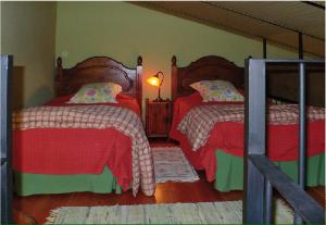 A bed or beds in a room at Cortijo Zalamea